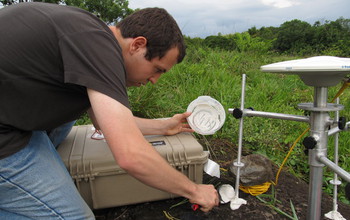 rsearcher with instruments in the field